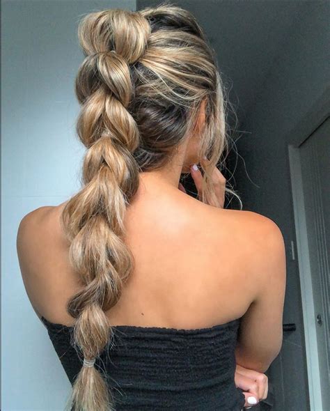 braided up into a ponytail